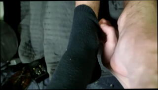 Watch the video about Huge boy feet