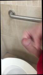 Watch the video about Jacking off my cock in a public bathroom!
