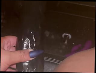 Watch the video about Fucking my huge dildo in the car