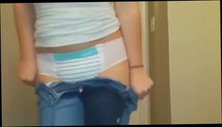 Watch the video about Girl wets pull-up til it drips