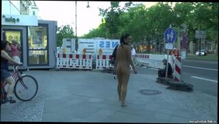 Watch the video about Crazy Babe Nicole Naked On Public Streets