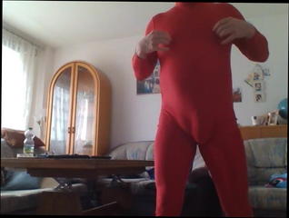 Video 1558346601: red catsuit, man gay