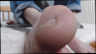Watch the video about Male feet pov
