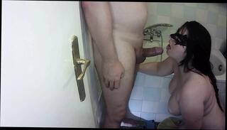 Watch the video about Cock hungry Stepmother throating her son while her husband watching TV