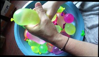 Watch the video about My excited hands playing with balloons