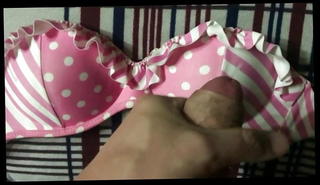 Watch the video about Pink Bikini cum