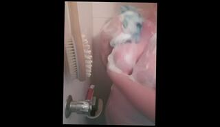 Watch the video about Sneaky Shower Soaping Huge Tits