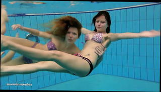 Watch the video about Katka and Kristy underwater swimming babes
