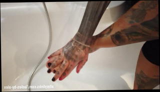 Video 1560648901: lady feet, homemade feet, feet straight, feet wash, bathtub feet, tattooed feet, feet opens, shower feet, blonde feet, lady sitting