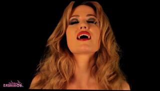 Watch the video about Horny Vampire babe masturbates for slave boy