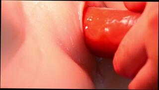 Watch the video about Playing with the hairless pussy