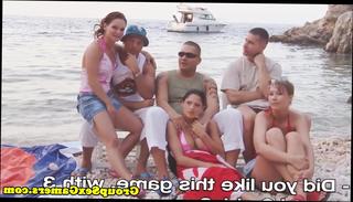 Watch the video about Beach amateur babes in group riding cock