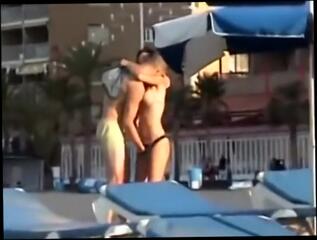 Video 738359704: amateur couple, beach couple, couple flashing