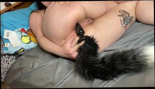 Watch the video about Cat plays with her tail