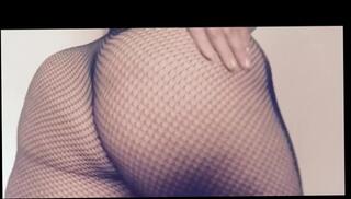 Watch the video about Curvy blonde in fishnets striptease and dildo play