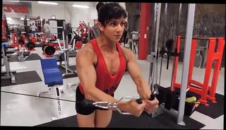 Watch the video about Muscular woman