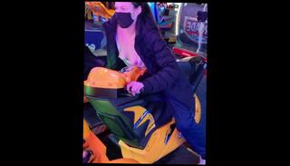 Watch the video about Risk Taking Wife Plays Arcade with Tits Out