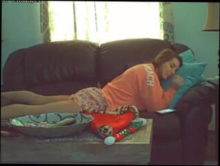 Watch the video about My junior horny wife humping our blanket on the couch.