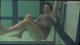 Watch the video about Katya Okuneva bouncing tits in a dress
