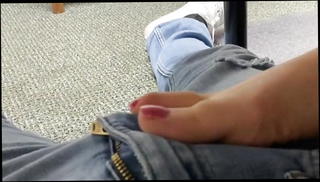 Watch the video about My Boss Uses Her Feet Under Table
