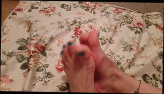 Watch the video about Tease footjob
