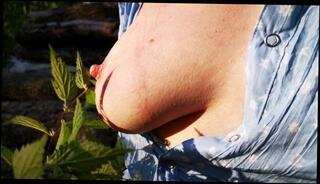 Watch the video about Nettle play in public - tits - Trailer