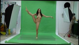 Watch the video about Big boobs Nicole on the green screen spreading