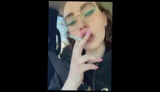 Watch the video about Smoking a cigarette in the car