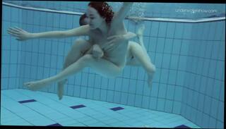 Watch the video about Two hot hairy beauties underwater