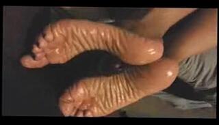Video 187354325: oiled foot job, oiled ebony, oiled soles