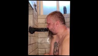 Watch the video about Slave practices cock sucking on dildo