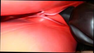 Watch the video about Sexy with latex suit on