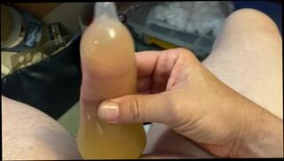 Video 1594331423: pissing peeing fetish, solo pee fetish, solo piss masturbation, condom pee, solo male pee, solo male masturbation cum, solo amateur cum, pee filled, strokes pees