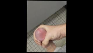 Watch the video about Cockdevotee Jerk Off In Public Bathroom Stall