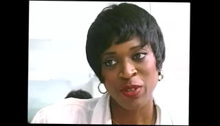 Watch the video about Muscular black man is getting erected while pretty ebony gives head to him