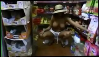 Watch the video about Exhibitionist Shows off her Breasts and Kitty in Public