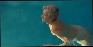 Watch the video about Granny in the pool with dildo inflatable