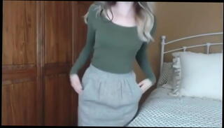 Watch the video about Beautiful woman in glasses undress