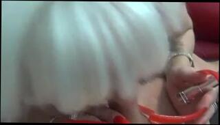 Watch the video about Handjob with long RED Nails Cumshot